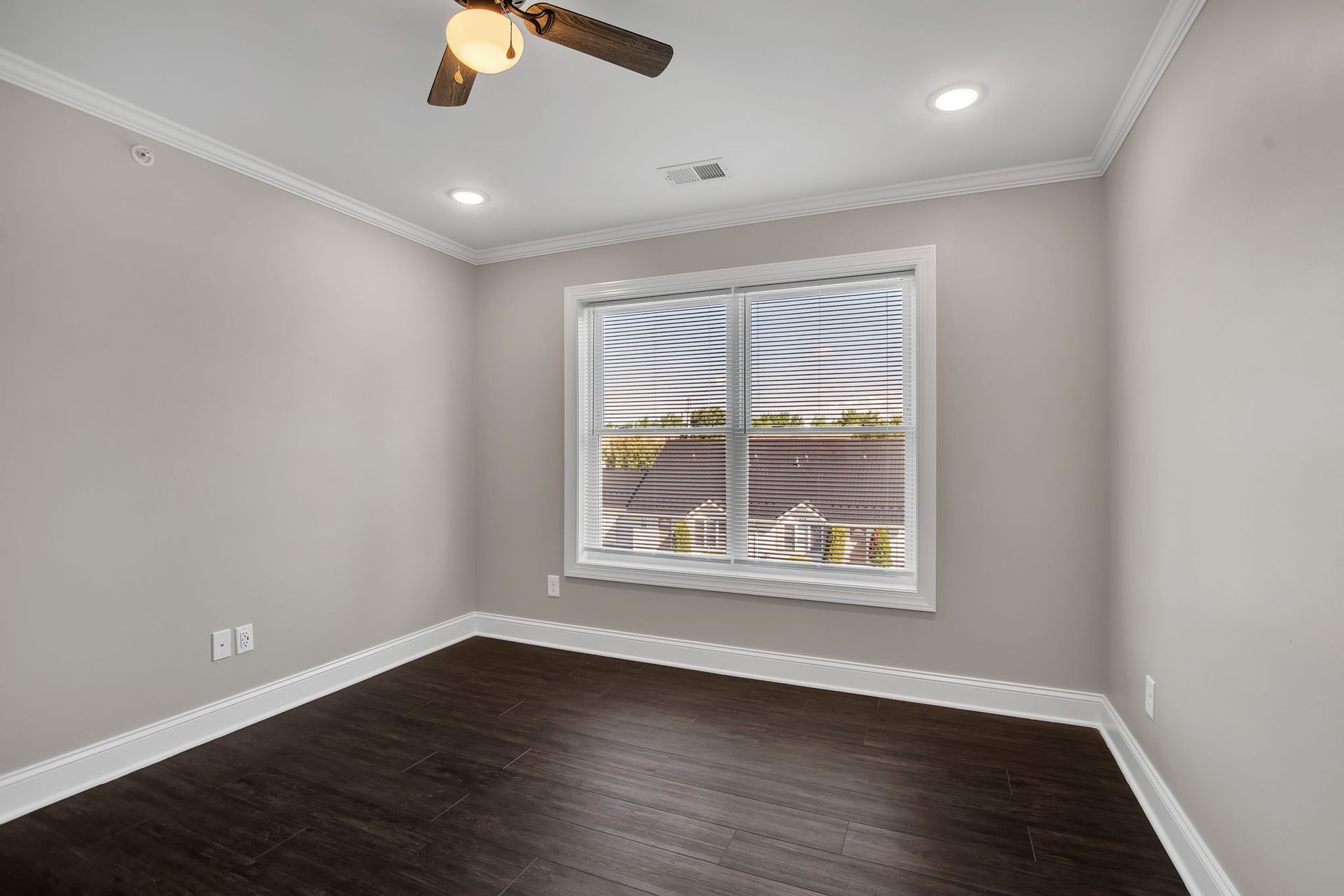 Apartment bedroom with smooth flooring and open layout design