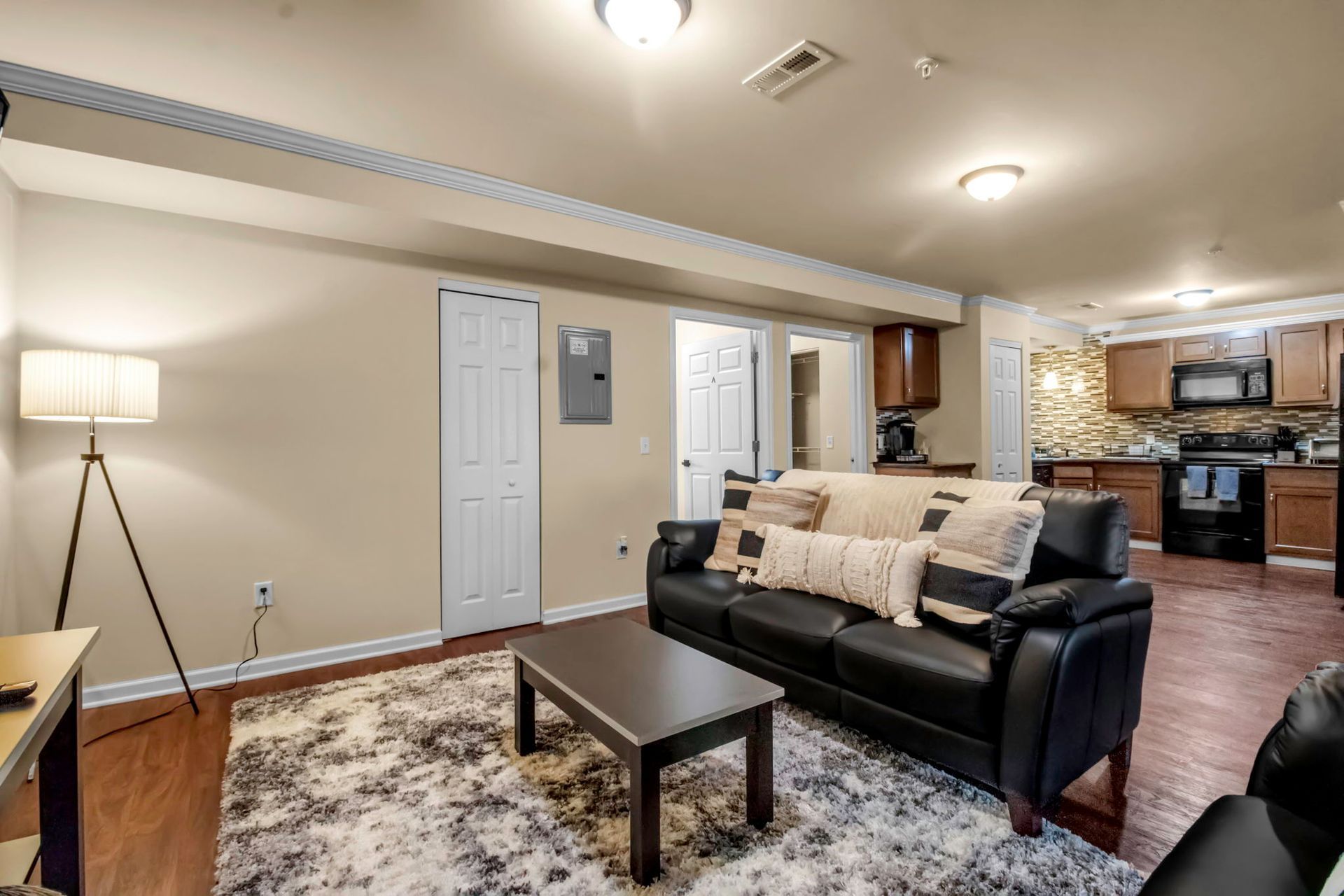 A living room with a couch and a coffee table