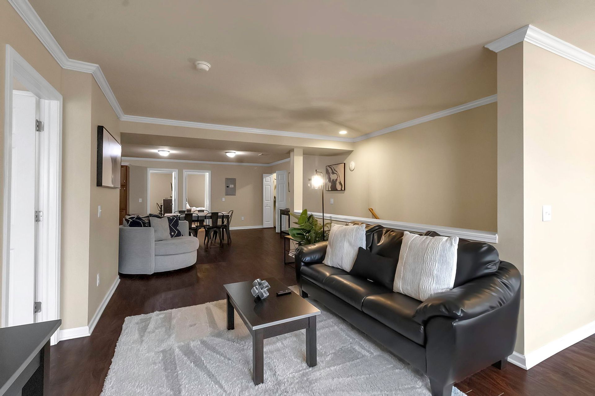 A living room with a couch and a coffee table