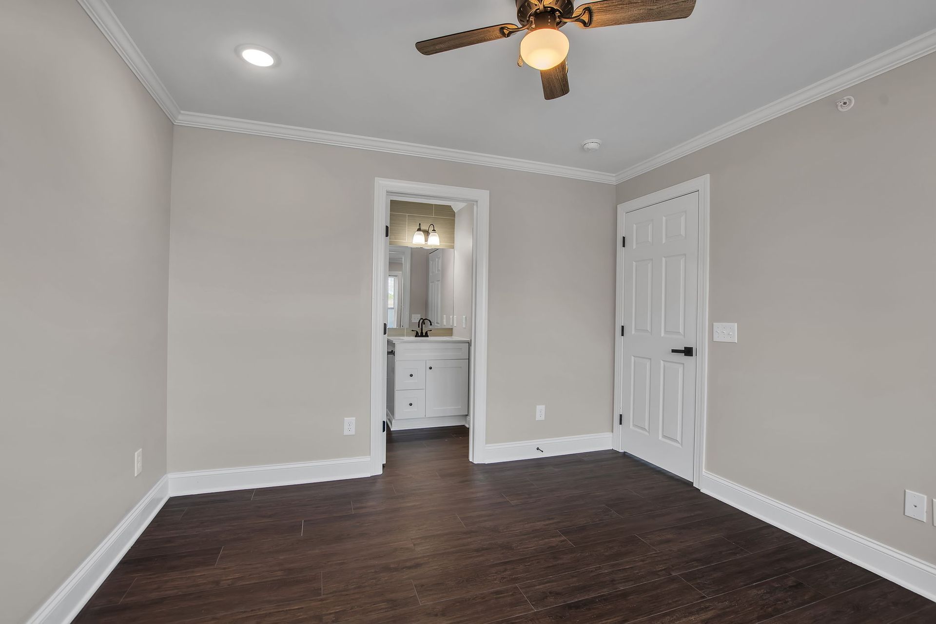 Bedroom space with modern flooring and clean interior layout