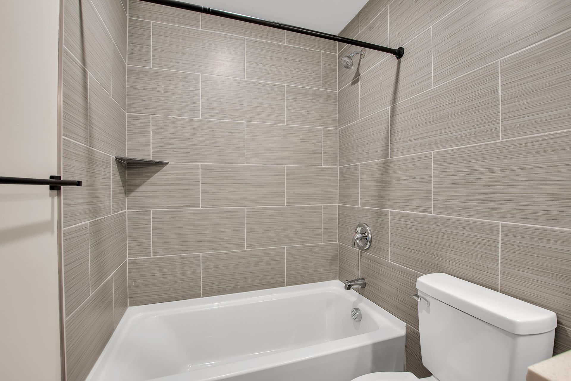 Washroom space featuring contemporary vanity and mirror design