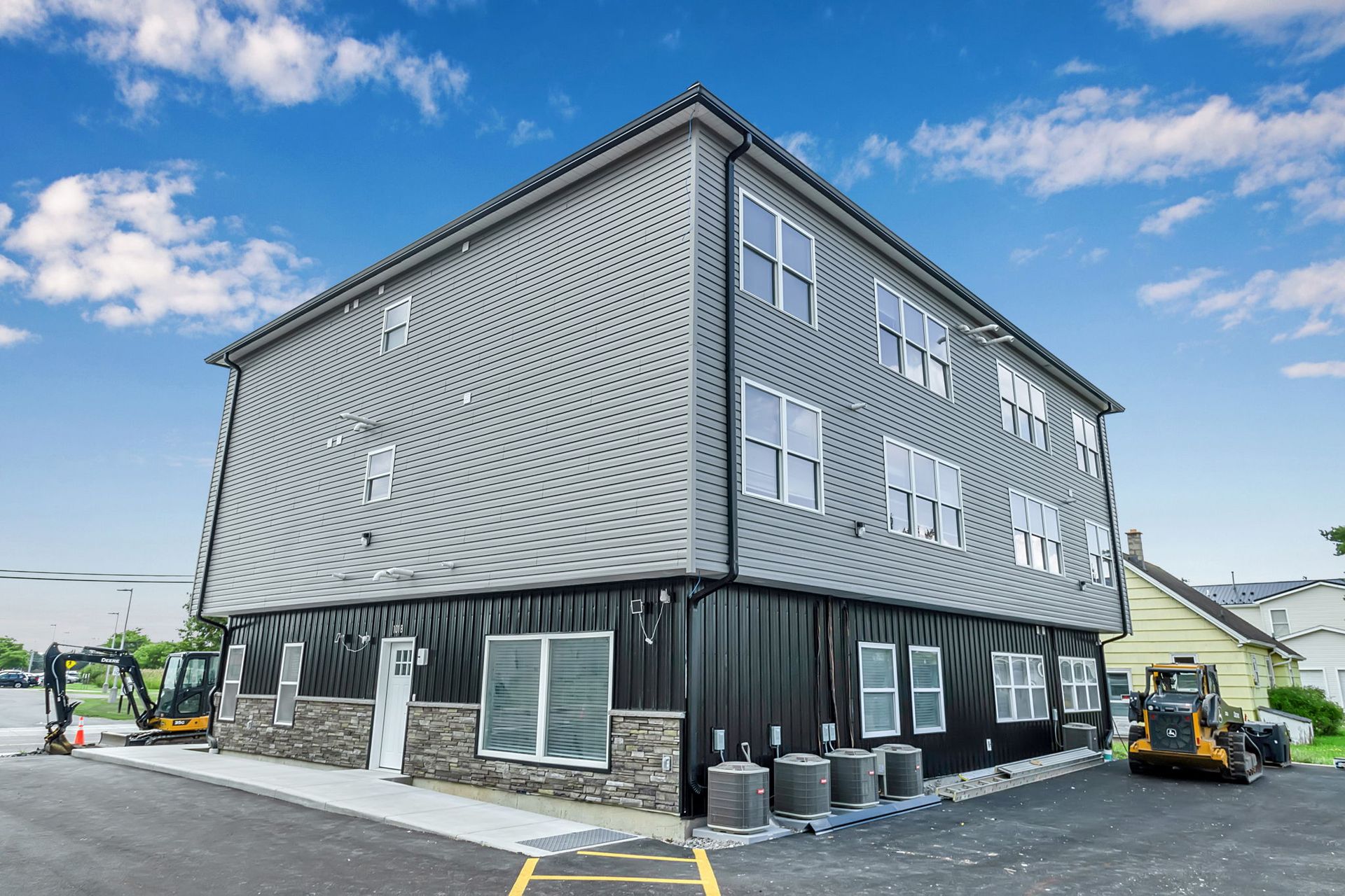 Multi-unit apartment homes with parking area in Amherst NY