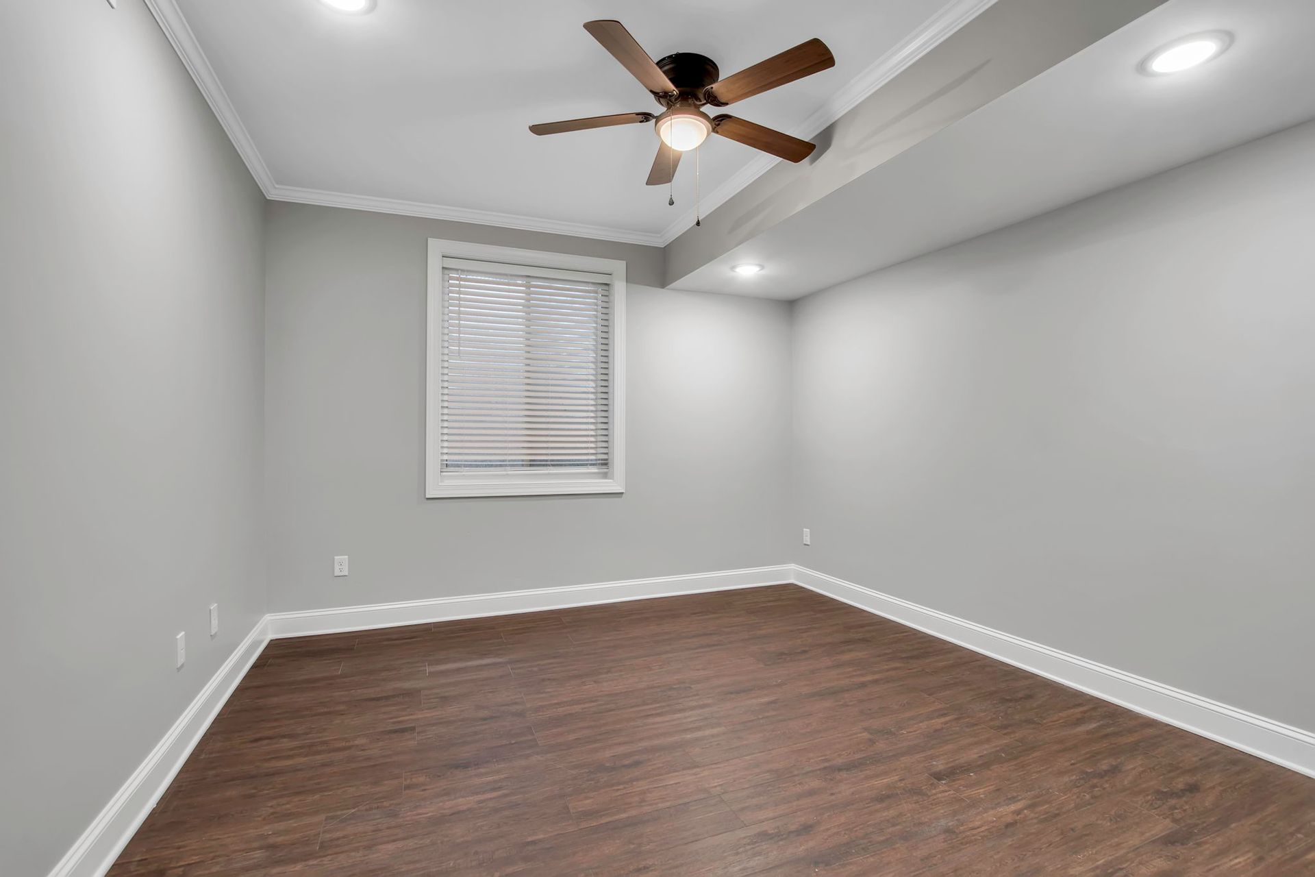 Sleeping quarters inside apartment with modern flooring finish