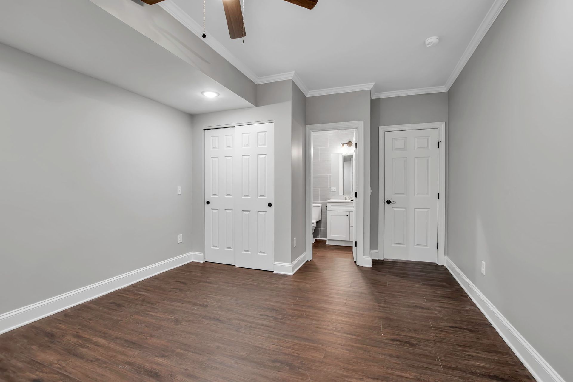 Apartment bedroom area featuring clean lines and open layout