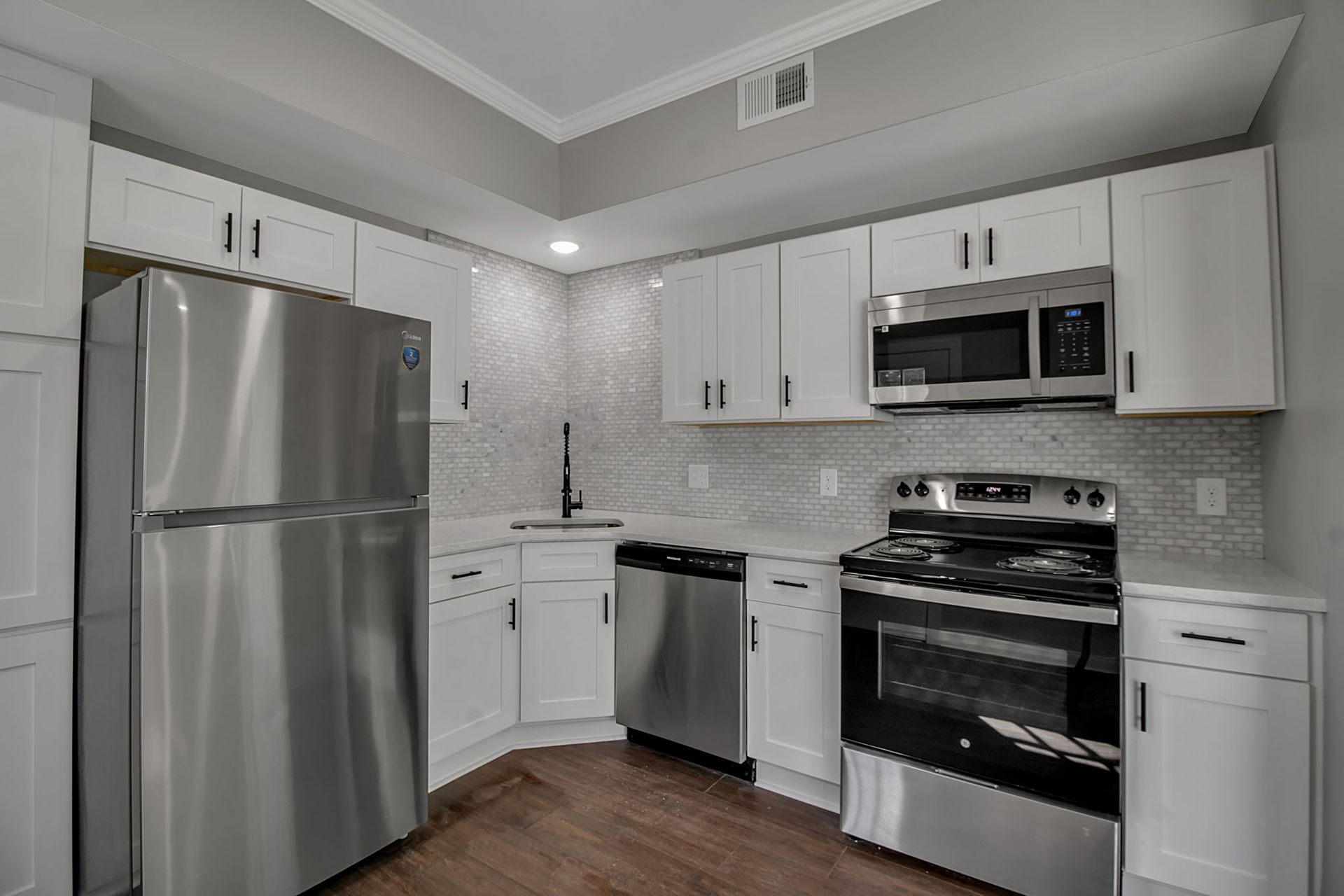 Apartment culinary workspace with modern kitchen layout