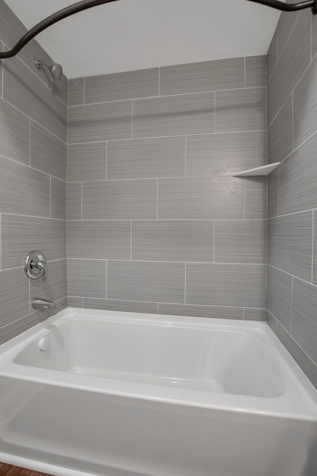 Wash area with updated plumbing elements and cabinet storage