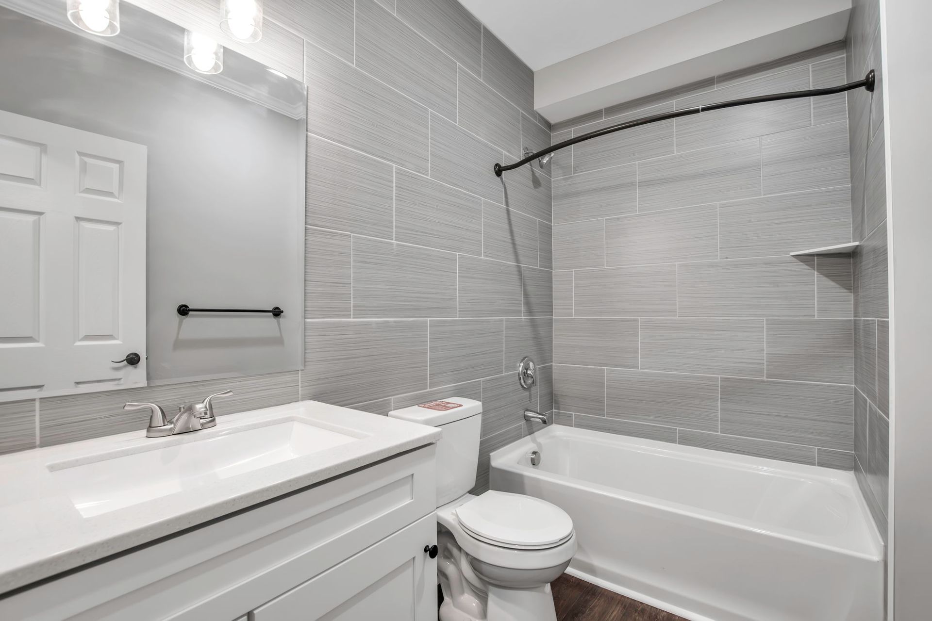 Washroom space with modern vanity cabinet and fixtures
