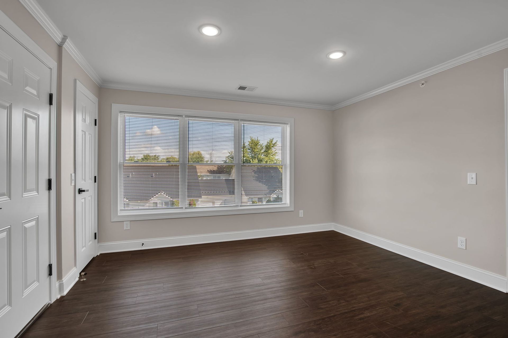 Bedroom space with updated finishes and structured layout