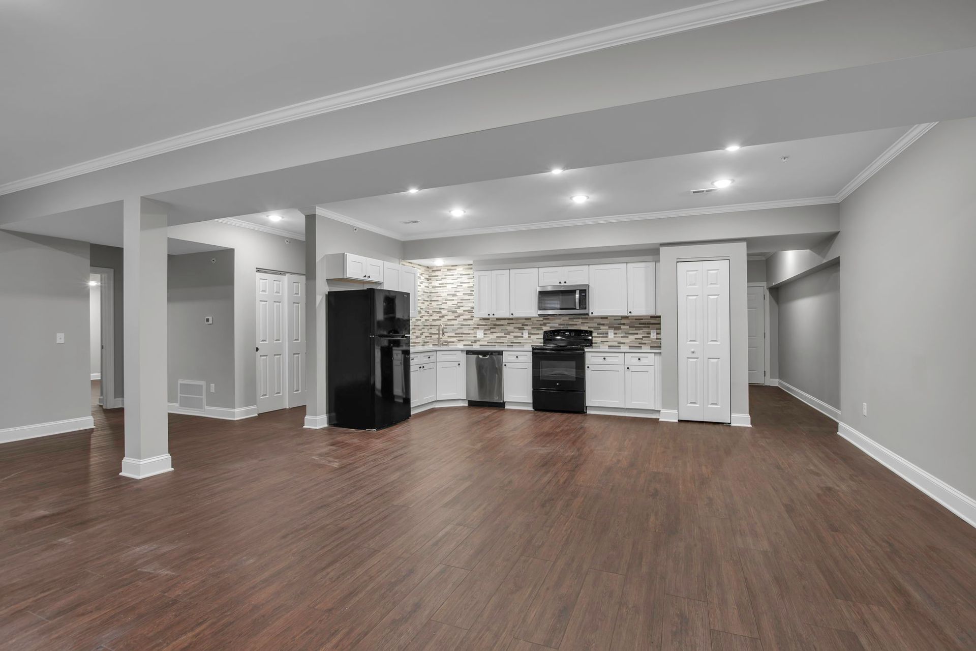 Apartment living area designed with spacious interior arrangement