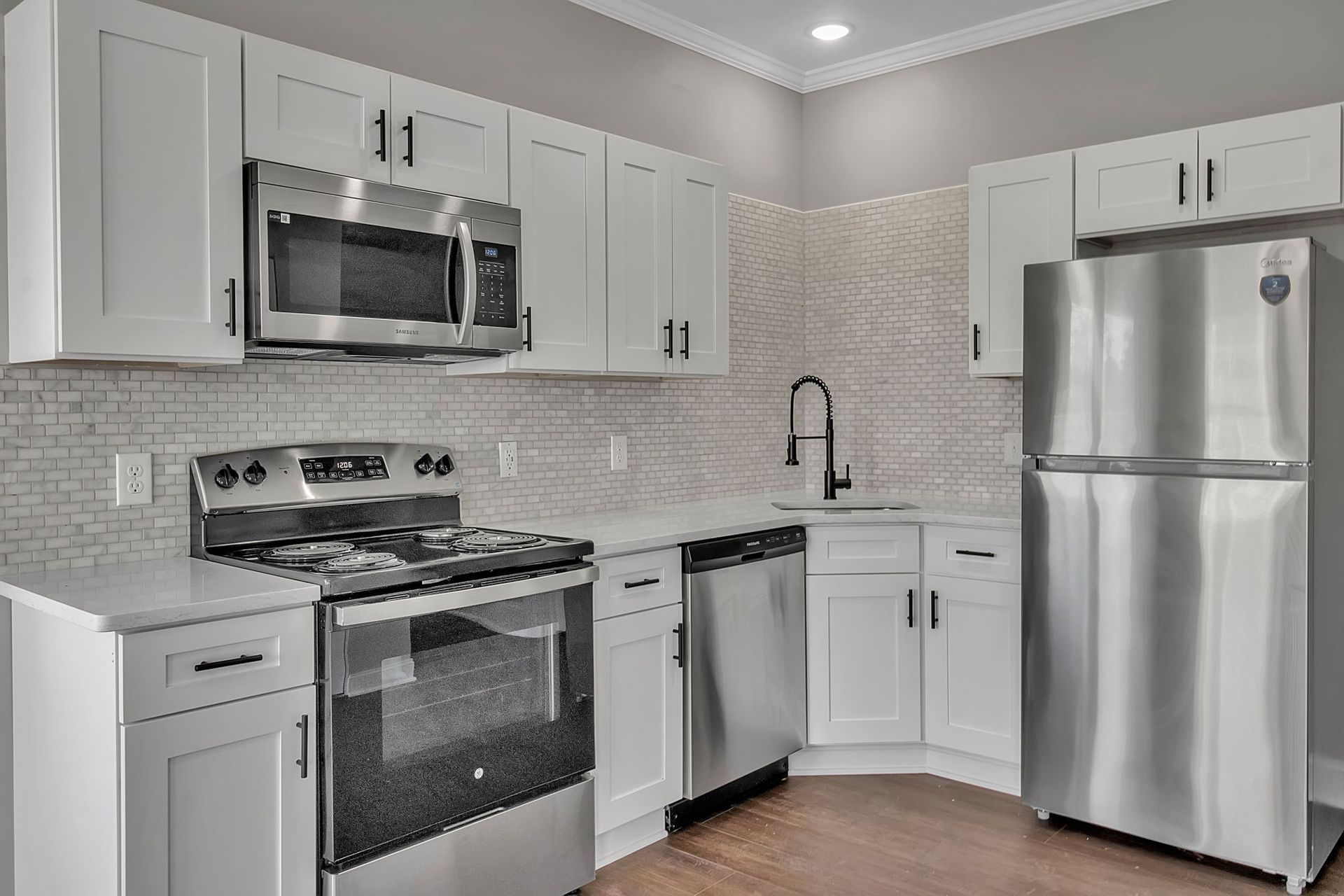 Spacious kitchen area with modern appliances