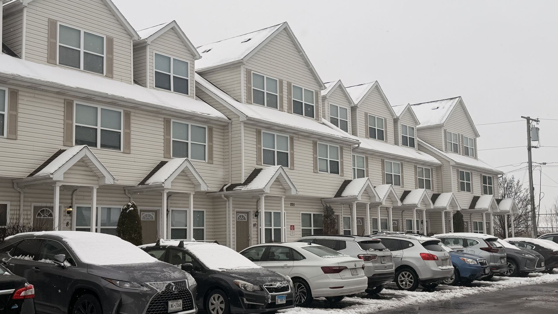 Wyse Properties apartment building covered in snow.