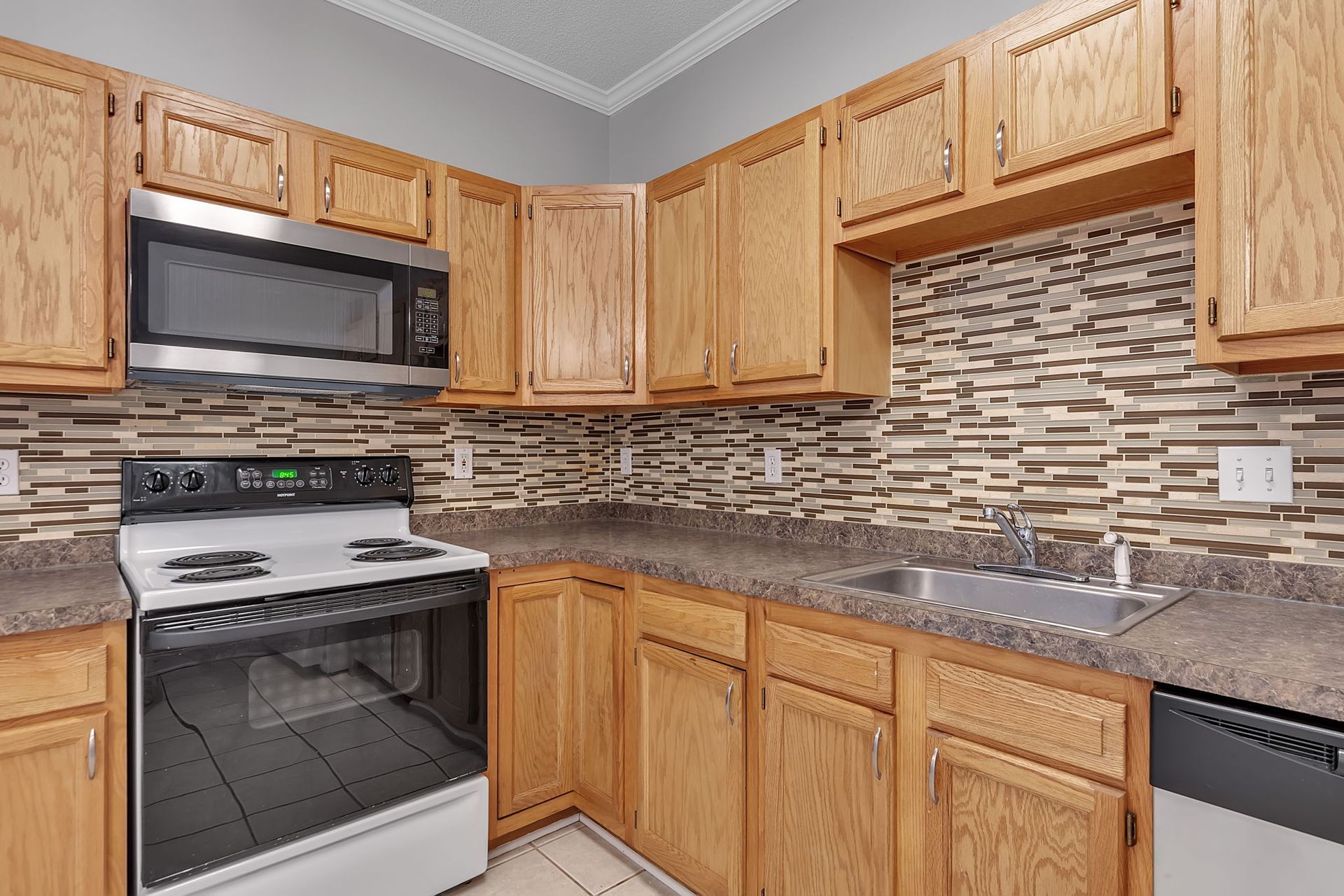 Apartment kitchen workspace with modern cabinet installation