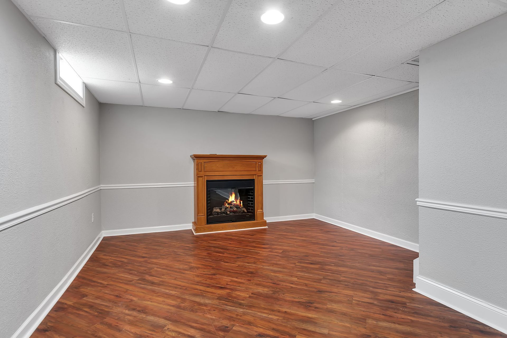 Living room with a wood burning fireplace