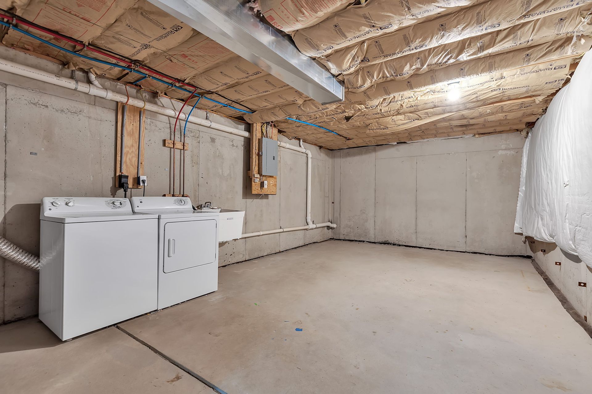 Apartment laundry area with washer and dryer