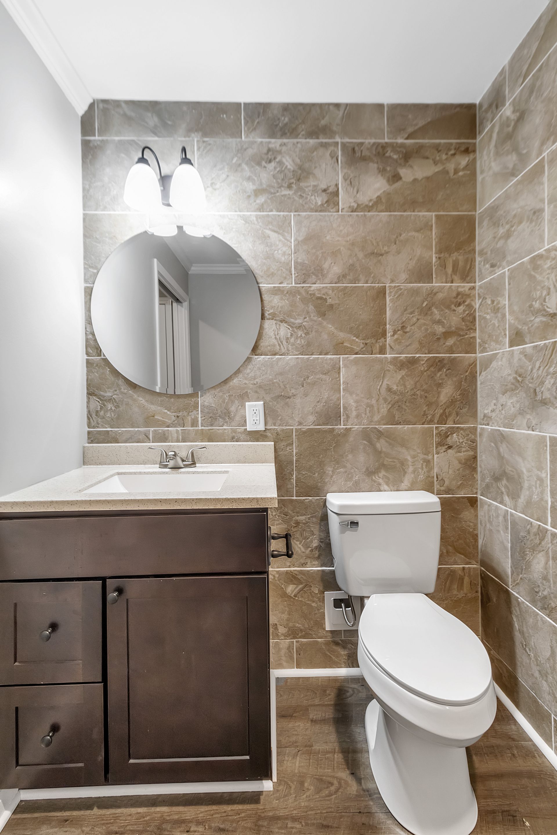 Apartment bathroom with contemporary wash area design