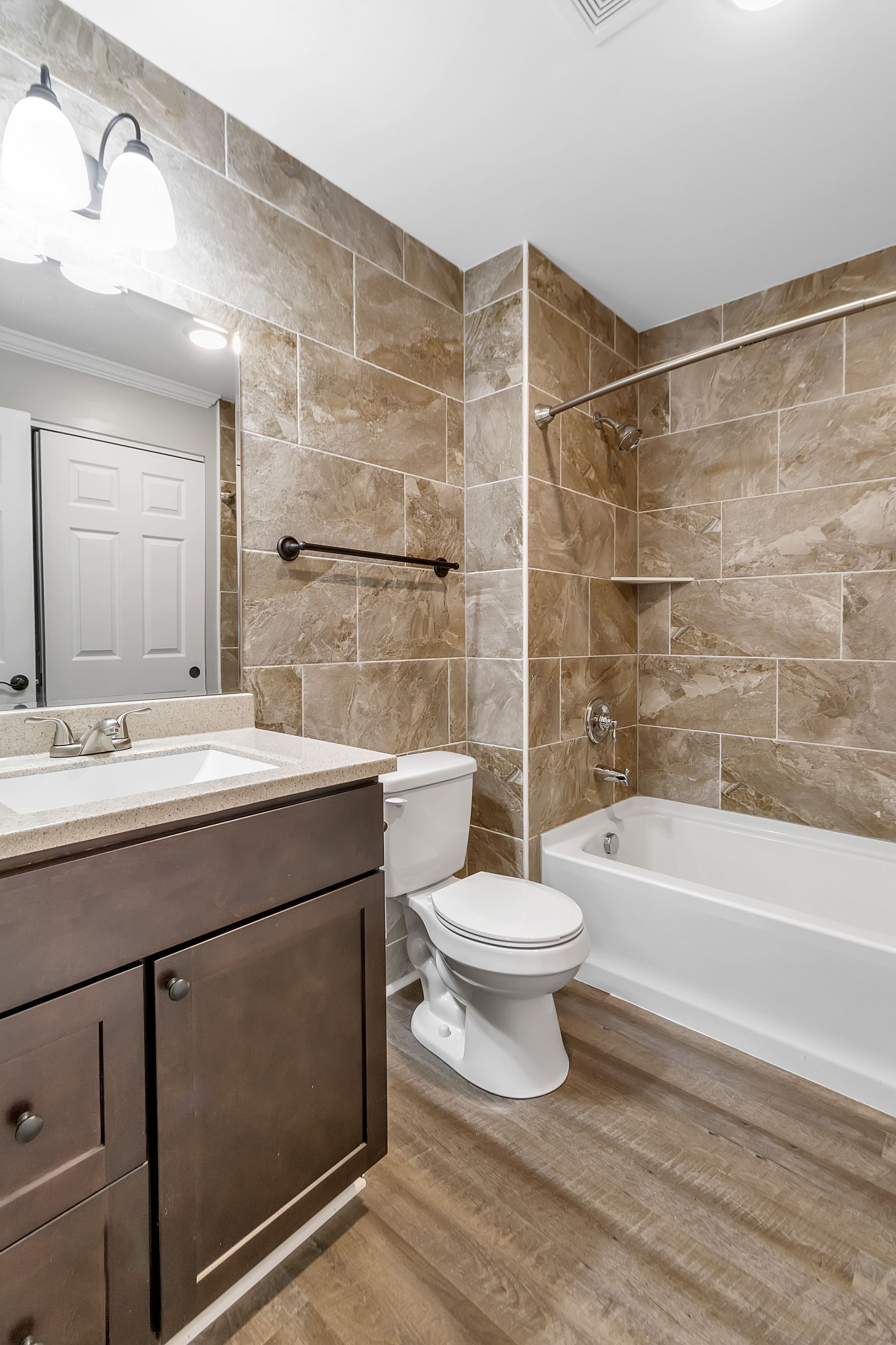 Bathroom interior with modern wall tile and sink unit