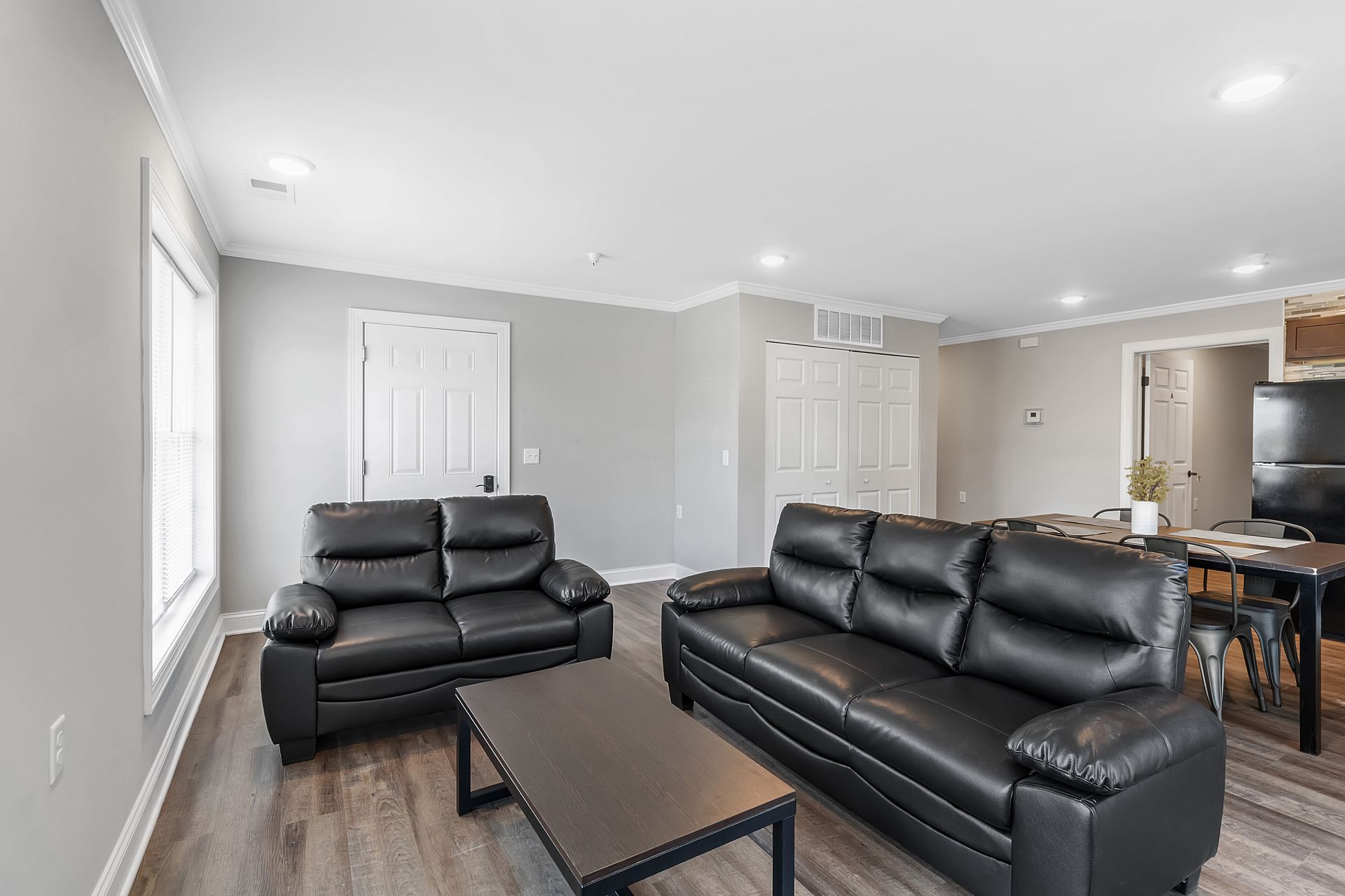 Bright living room with wide window and natural sunlight