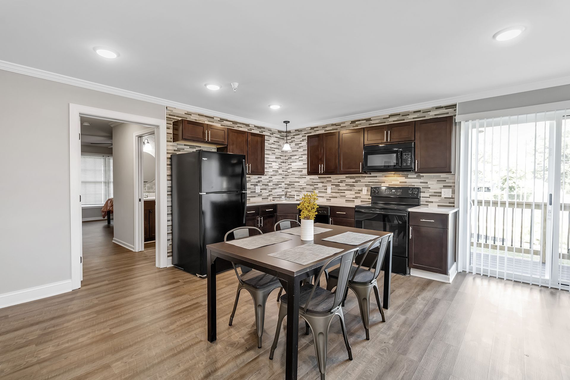 Bright kitchen with clean counters and cabinet storage
