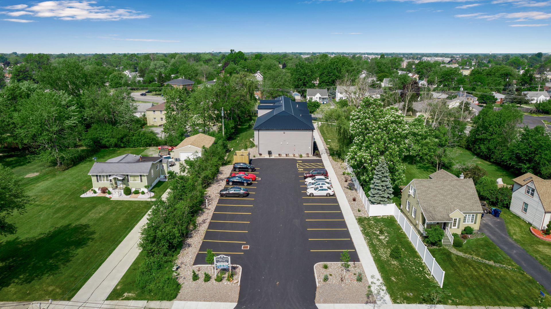 Resident parking area near apartment buildings