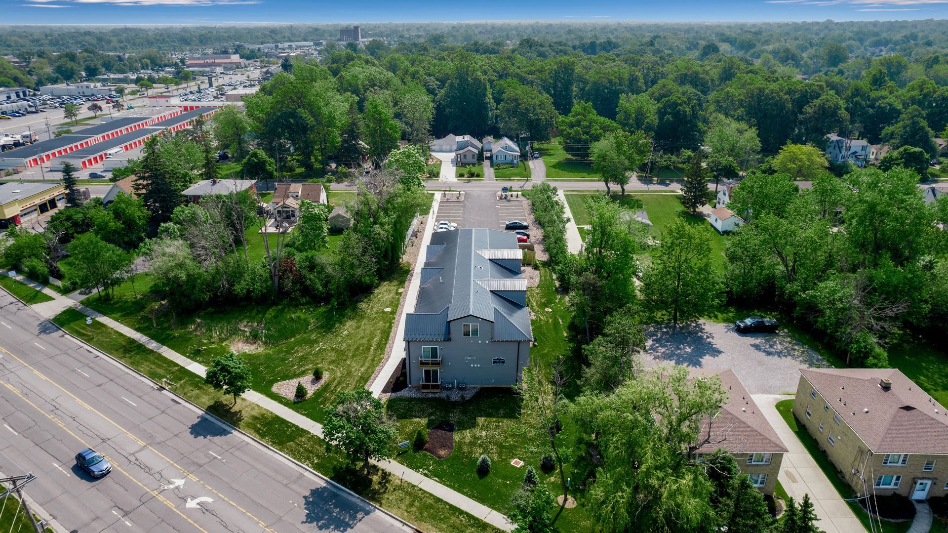 Drone perspective showing apartment buildings and surrounding streets in Amherst NY