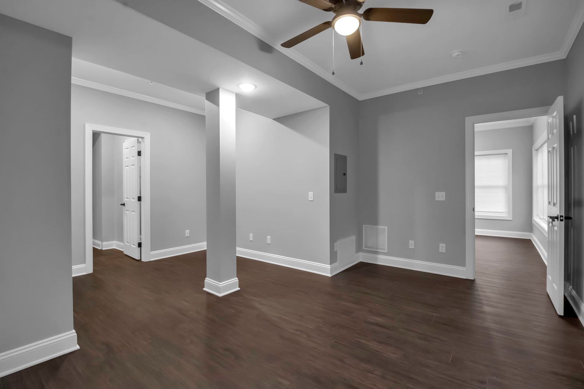 Apartment living room with contemporary flooring and natural light