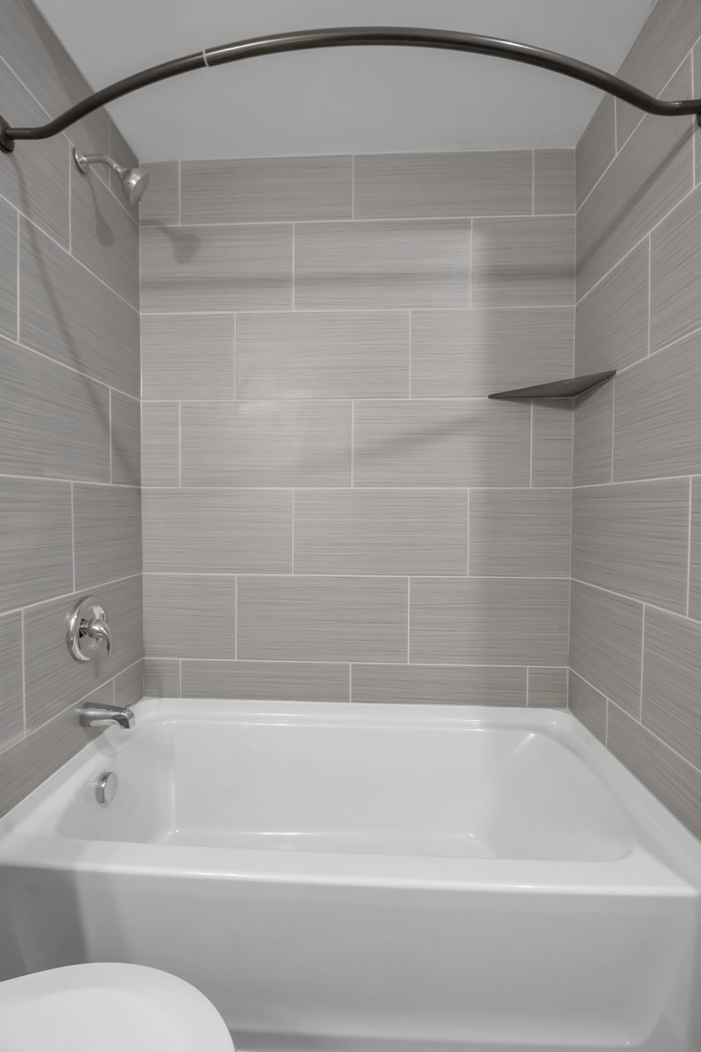 Updated apartment bathroom with modern fixtures