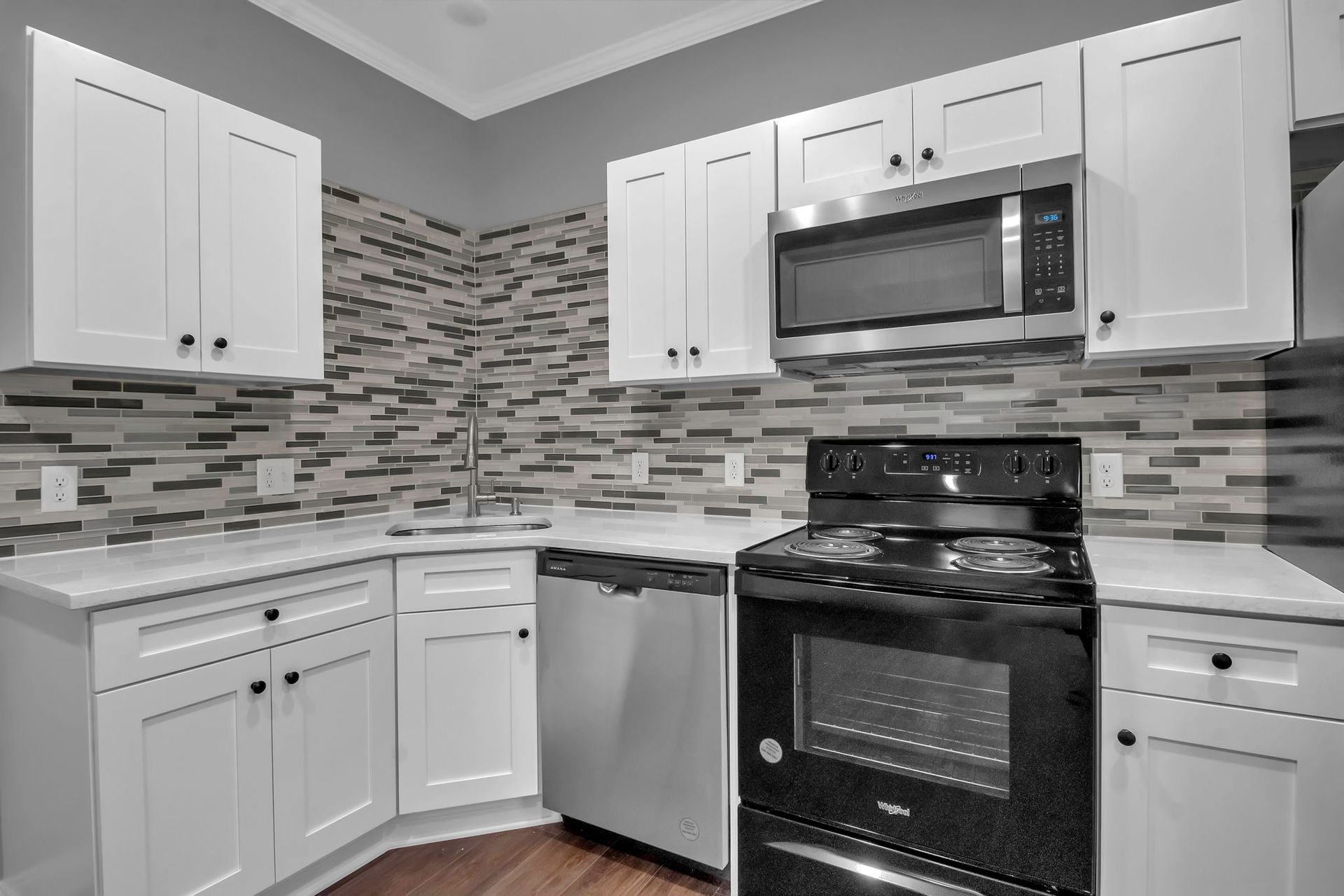 Spacious kitchen area with modern appliances