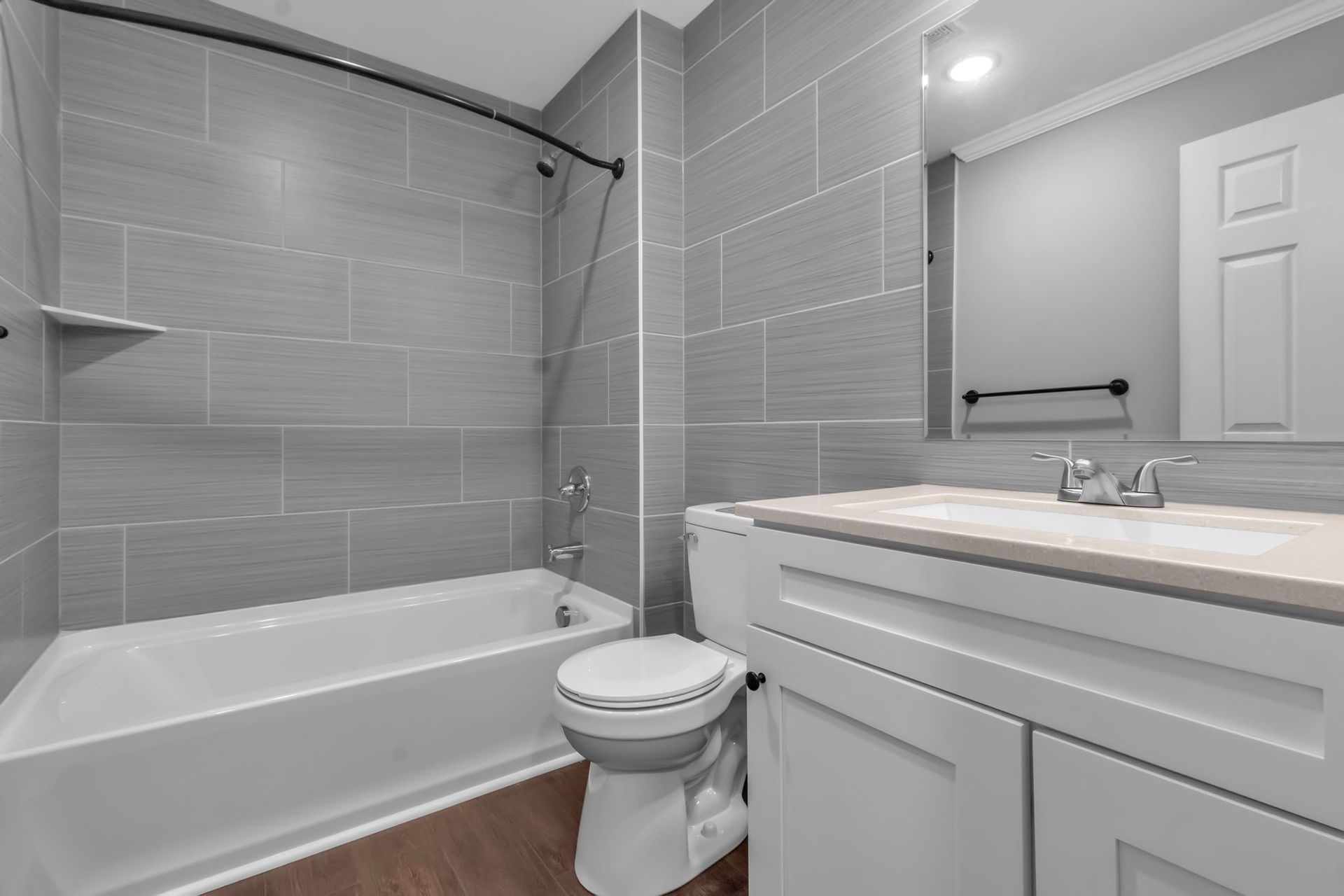 Washroom interior with polished fixtures and mirror installation