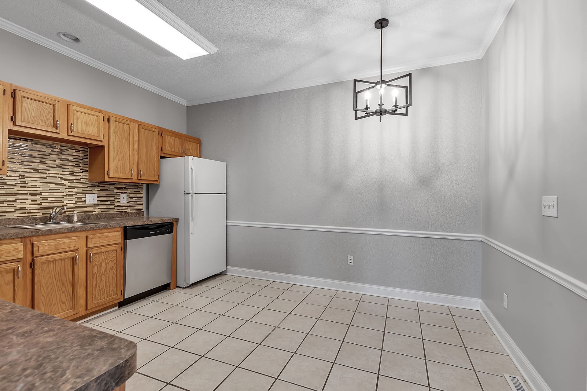 Apartment kitchen with open floor plan and natural light