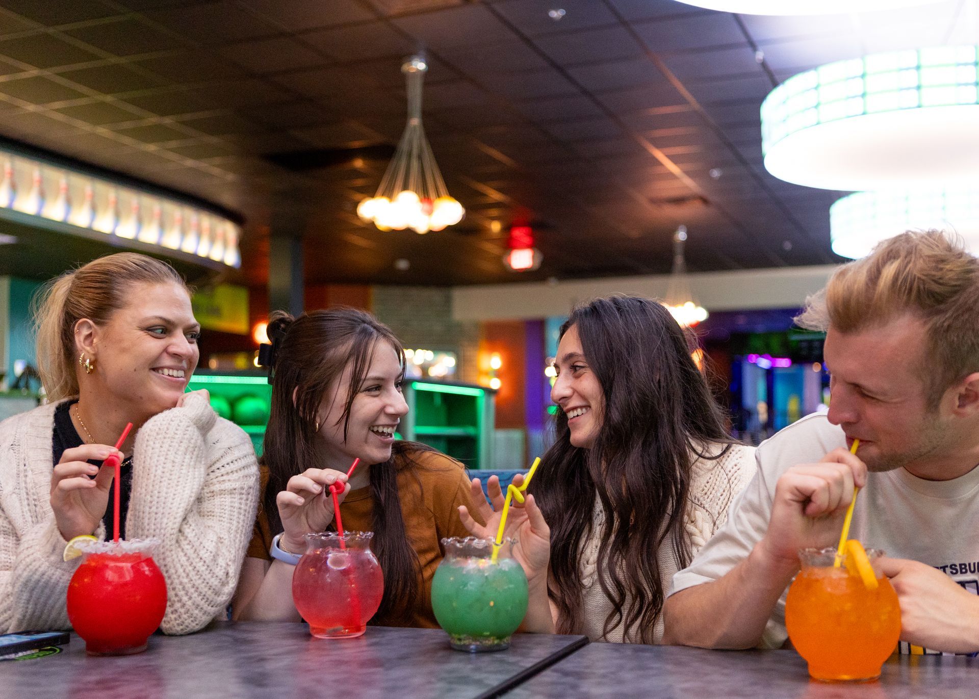 Friends enjoying drinks at Zone 28 Ultimate 28 group package