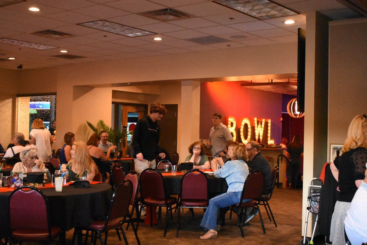 Guests at round tables in the Suite 28 banquet room at Zone 28 in Pittsburgh