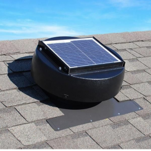Black rooftop solar attic vent mounted on gray shingles under a blue sky