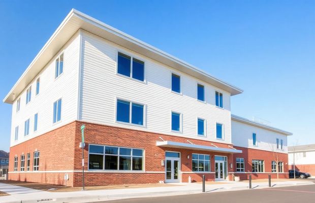 
Exterior rendering of the three-story BHA Dream Center building