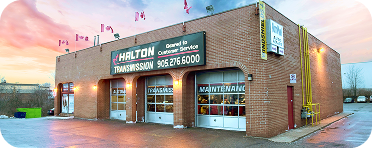 A brick building with a sign that says halton transmission | Halton Auto Service & Transmission