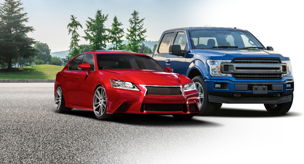 A red car and a blue truck are parked next to each other on a road. | Halton Auto Service & Transmission