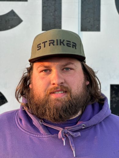 Man wearing a green 