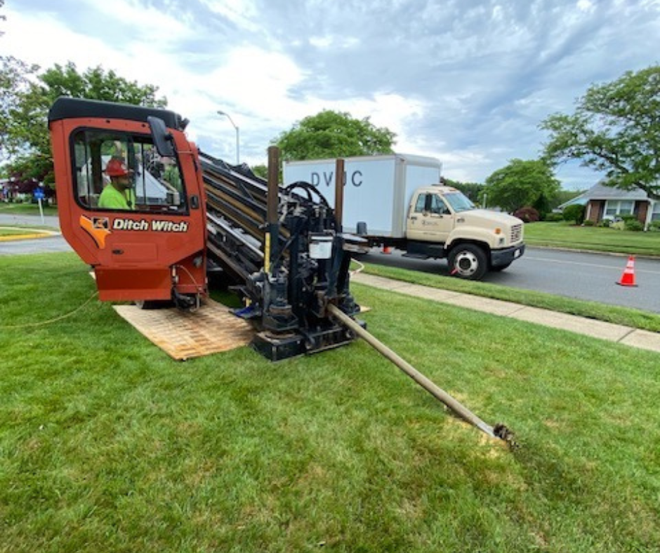 Using horizontal directional drilling to install wires for a residential community. 