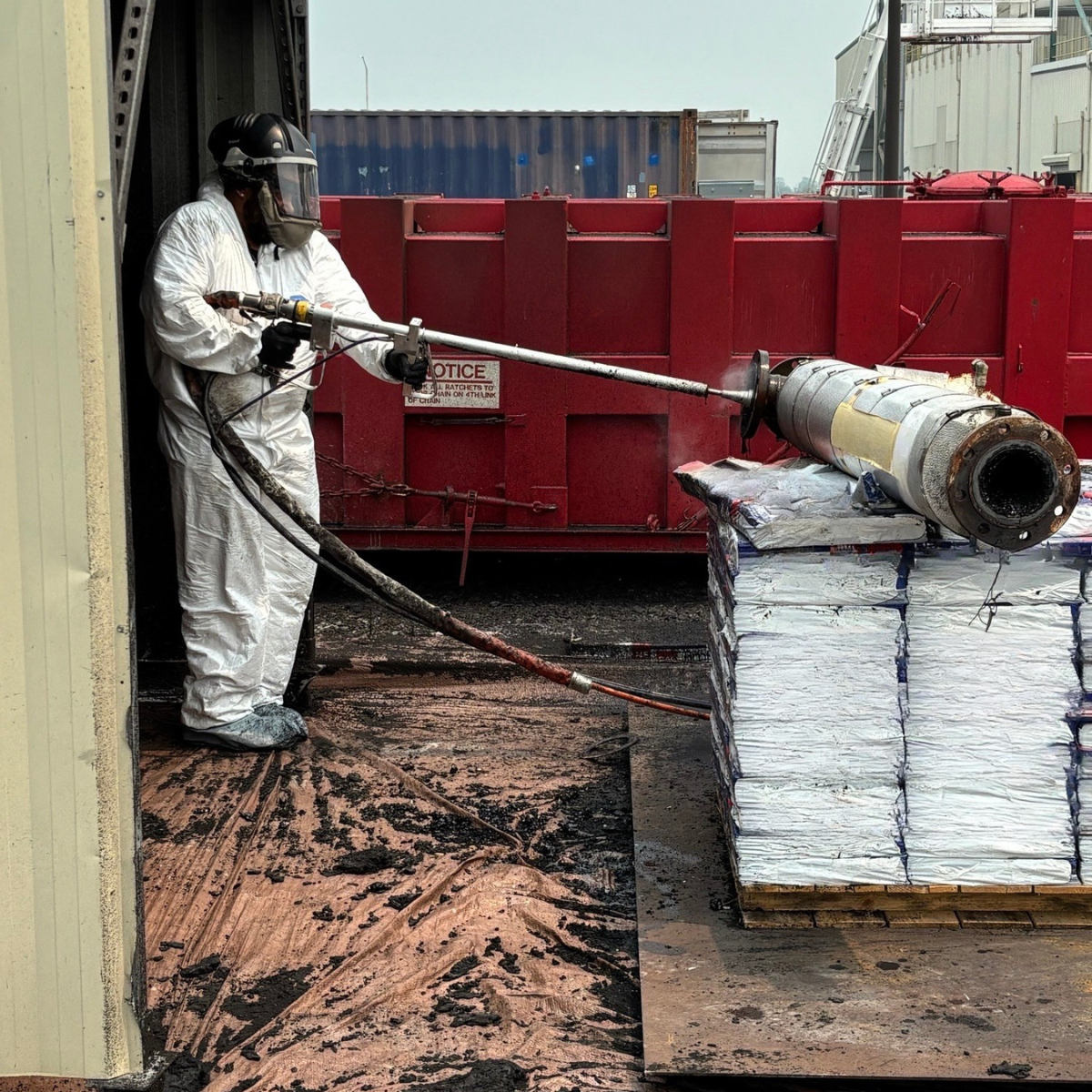 The Elk Environmental Services Team uses a hydro-blaster to clean process piping at a roof manufacturer.
