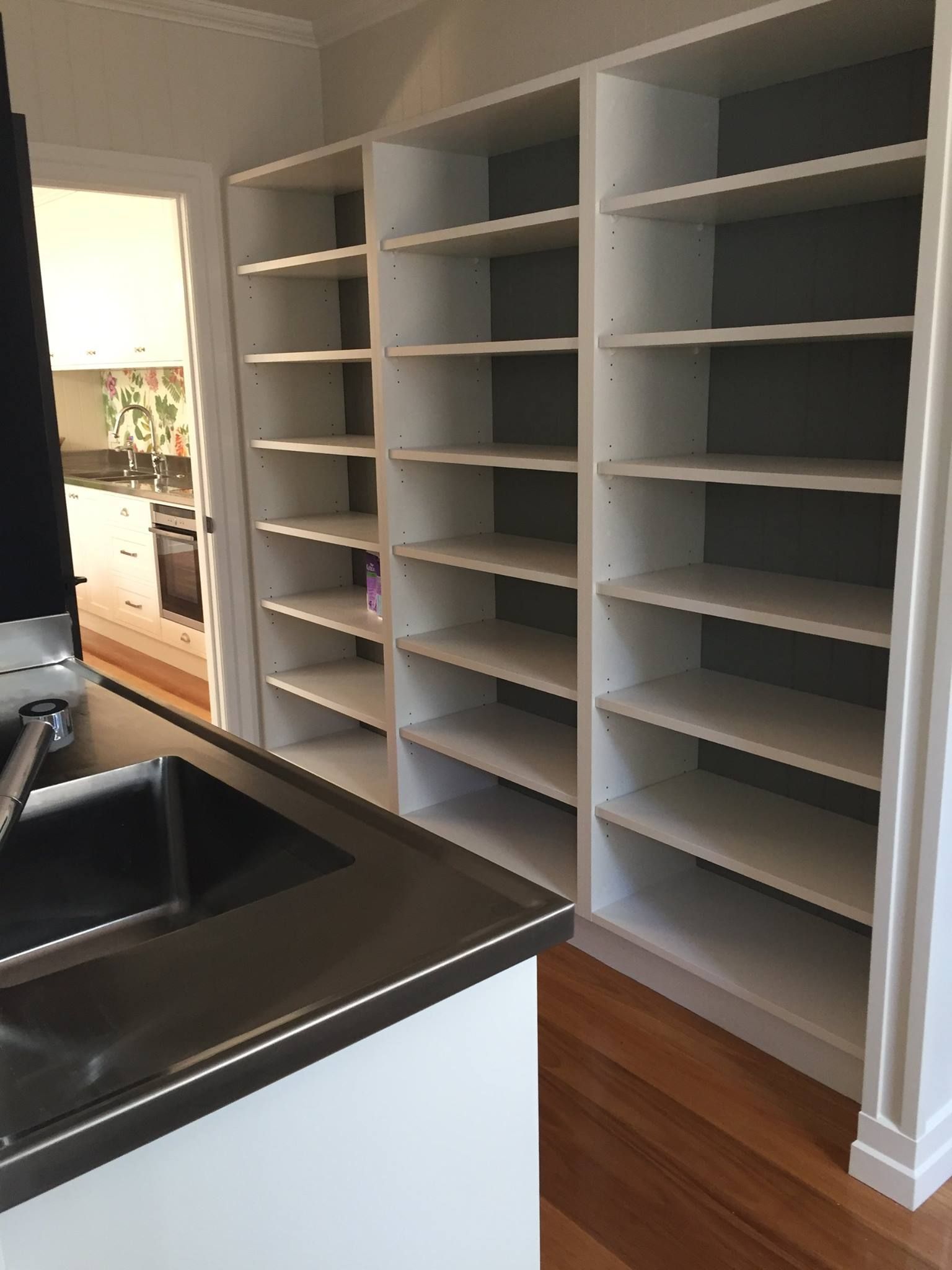 A Kitchen With Lots Of Shelves And A Sink — North Coast Cabinets In Tweed Heads, NSW