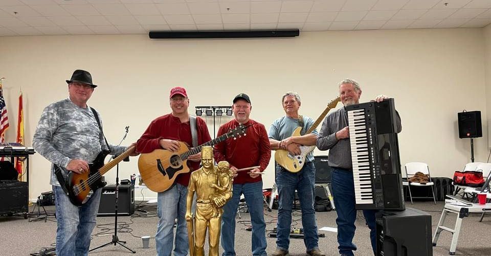 Full Circle Party Band posing with instruments