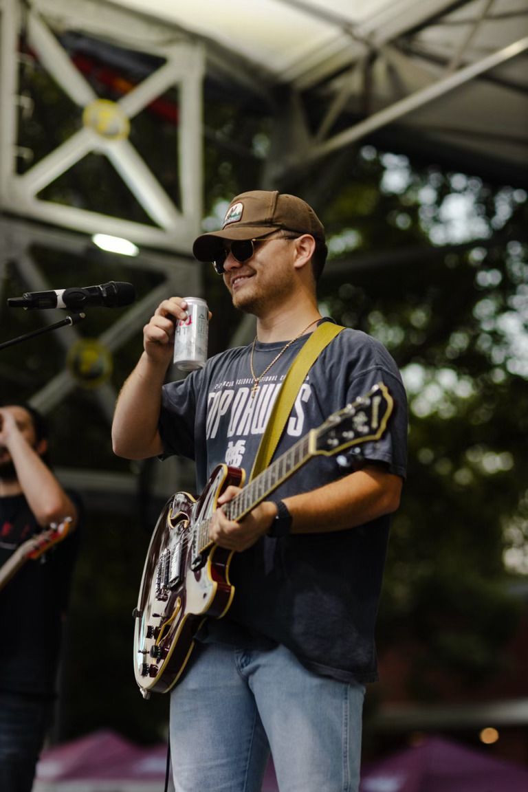 Logan hogue performing on stage