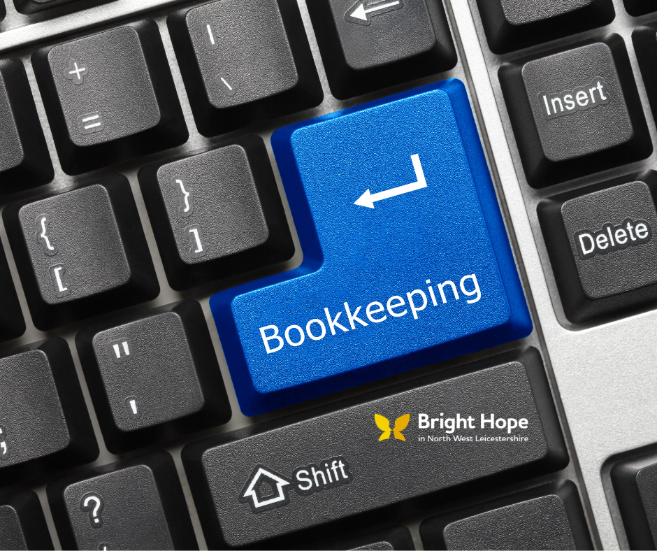 Blue keyboard key labeled “Bookkeeping” among black keys, with nearby Insert and Delete keys.
