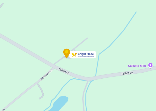 Map showing a pinned location near Bright Hope Church and Grove Inn, with roads and a stream.