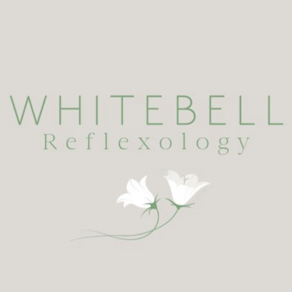 WHITEBELL Reflexology logo with pale green text and two white flowers on a light beige background