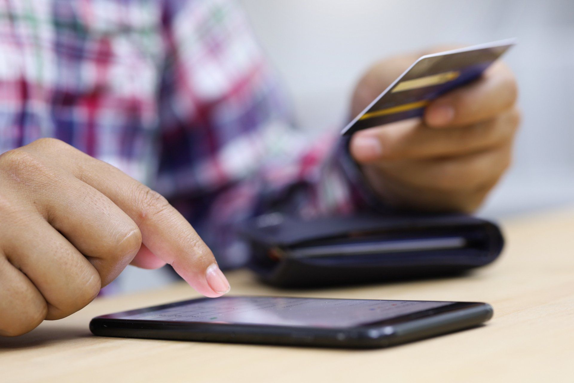 Person Using a Smart Phone — Jackson, MS — Gadow Tyler