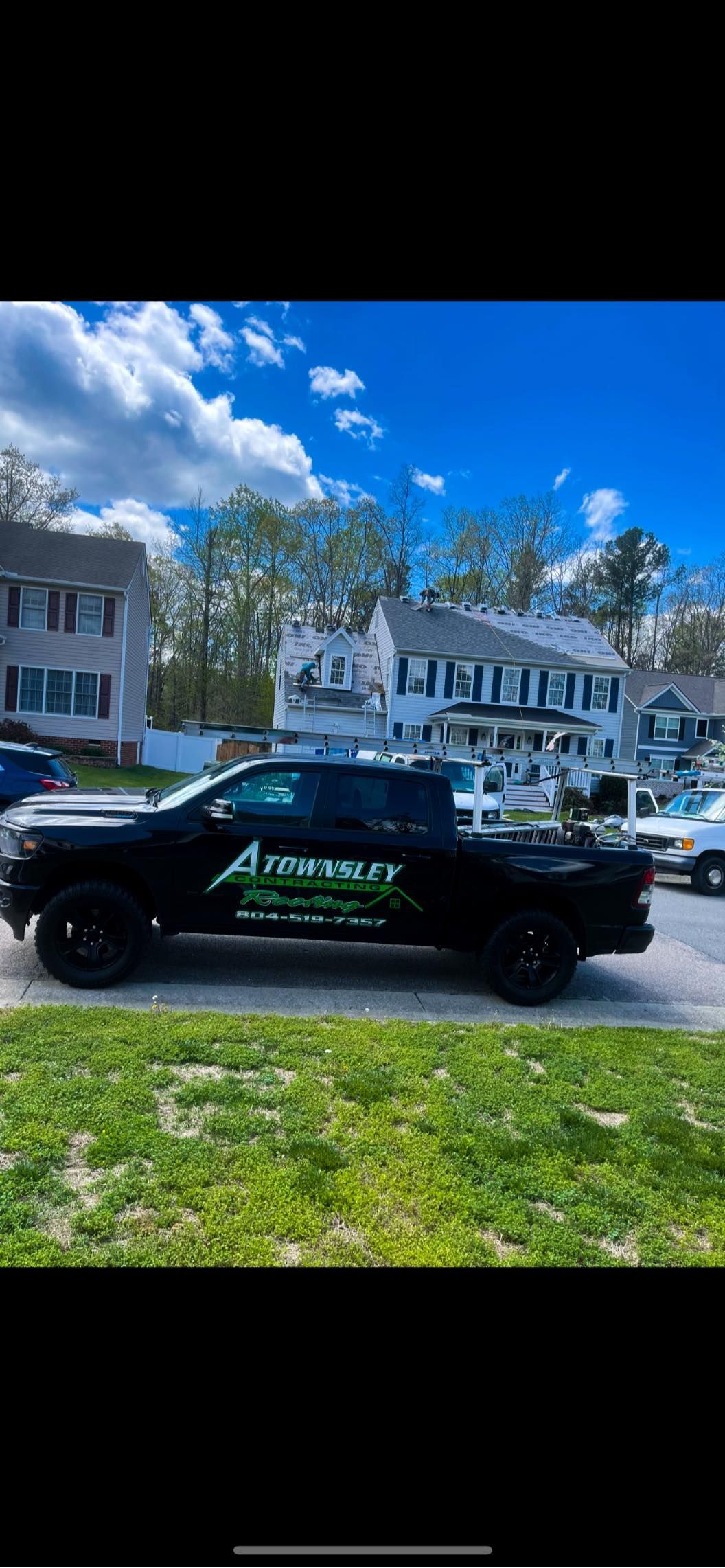 A Black Truck is parked on the Side of the Road - Chester, VA - A. Townsley Contracting