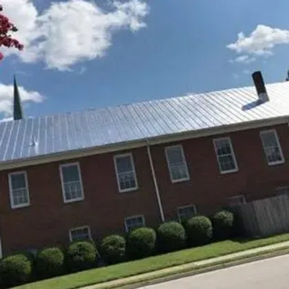 A large Brick Building with a Metal Roof - Chester, VA - A. Townsley Contracting