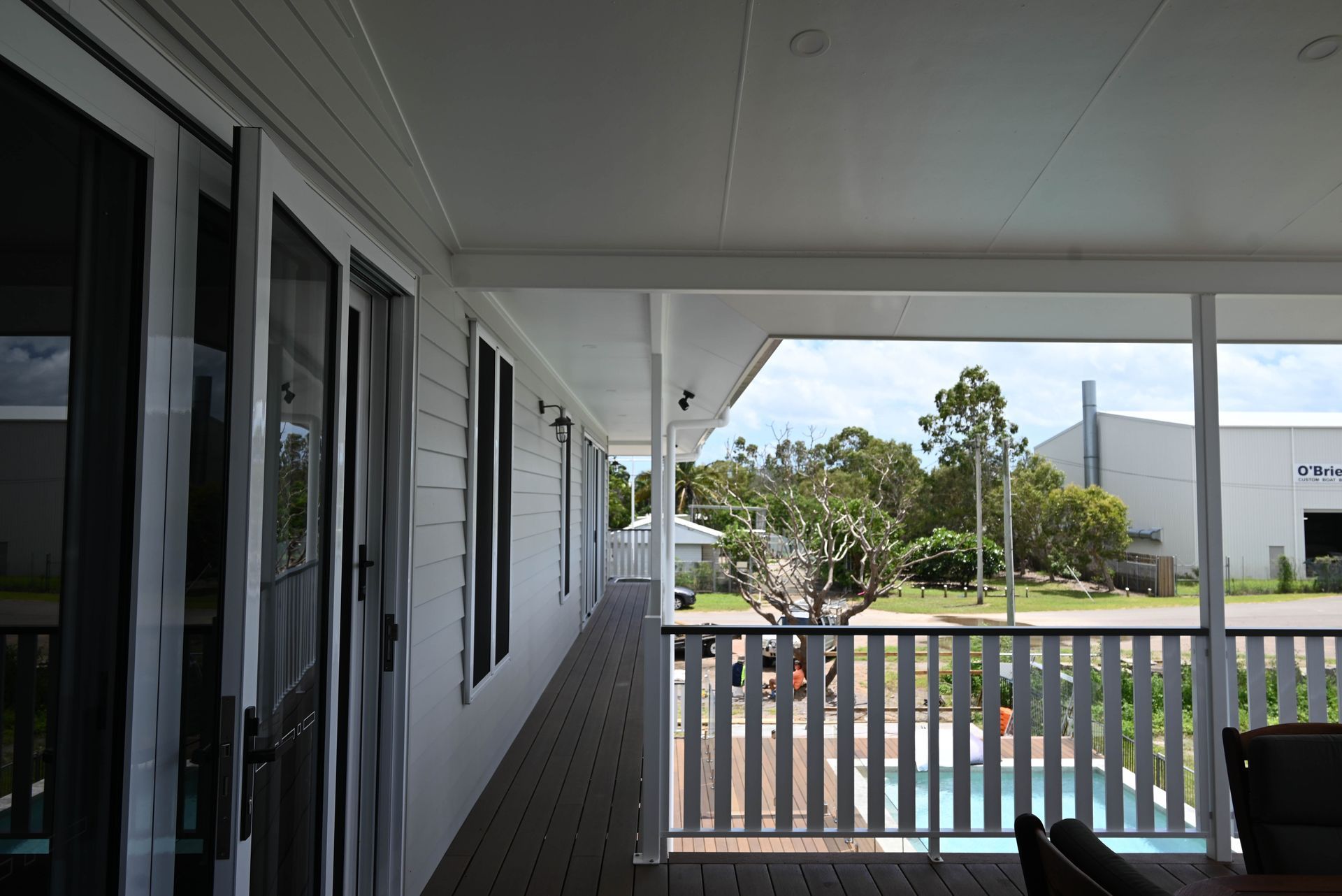 A Small House is Lit Up at Night in the Middle of a Field — Drawing Works In Mackay, QLD