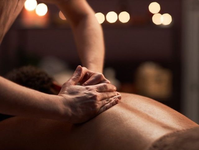 Relaxing aromatherapy massage by candlelight