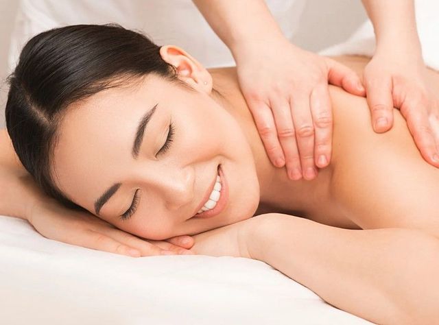 Client relaxing during a massage in Coventry